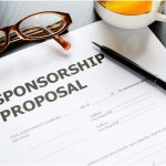 Selembar kertas bertuliskan "SPONSORSHIP PROPOSAL".